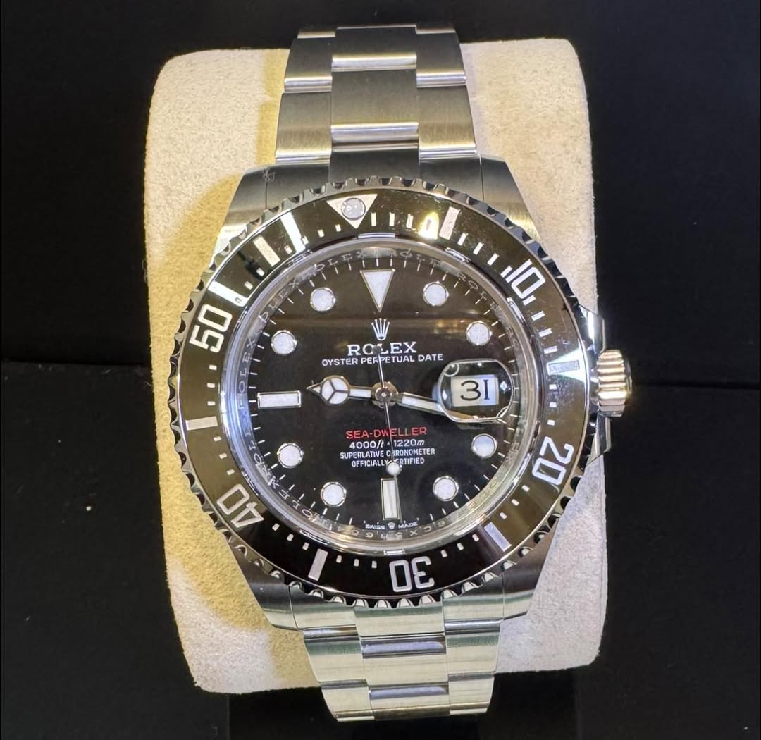 May be an image of wrist watch and text