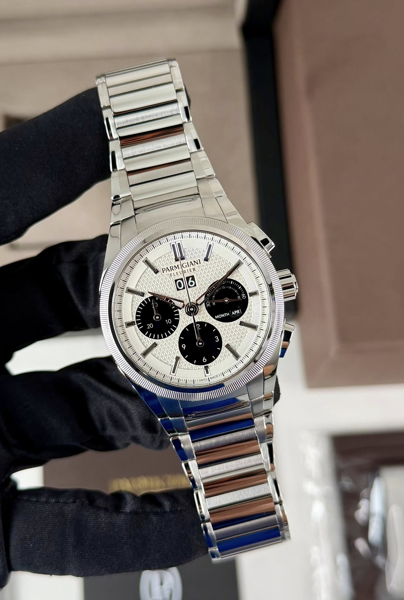 May be an image of wrist watch and text
