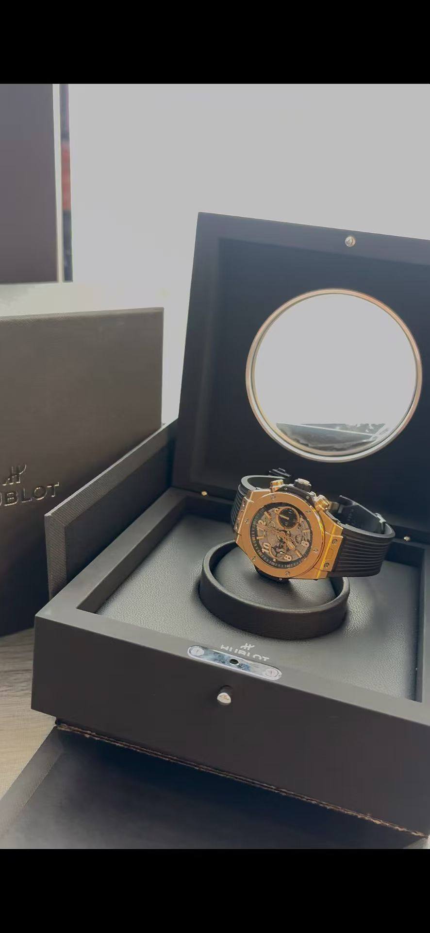 May be an image of wrist watch and text
