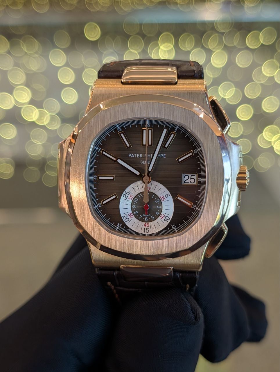 May be an image of wrist watch and text