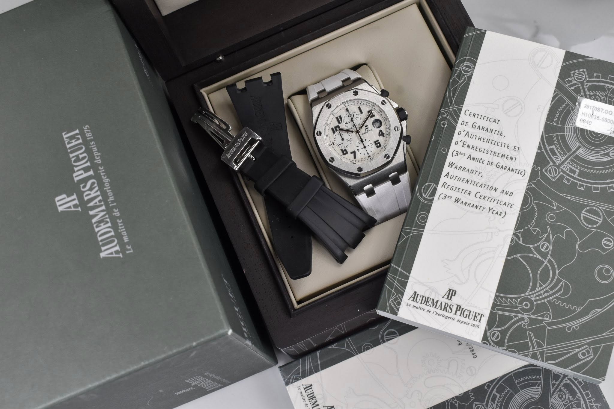 May be an image of wrist watch and text that says '/ PIGUET 1875 depuis AP ARS AUDEMARS el de "horlogerie maitre Le DE GARANTIE, CERTIFICAT D'ENREGISTREMENT ET AUTHENTICITE (3…