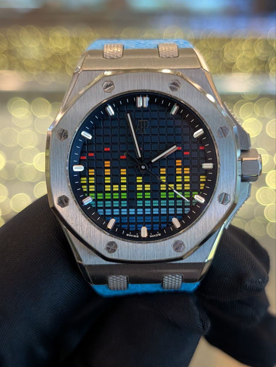 May be an image of wrist watch and text that says '0 U SWIDS MADE'