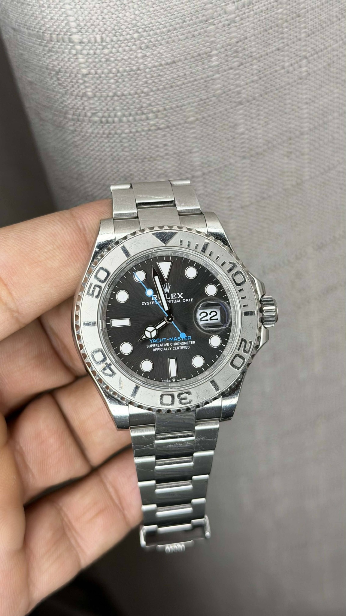 May be an image of wrist watch and text