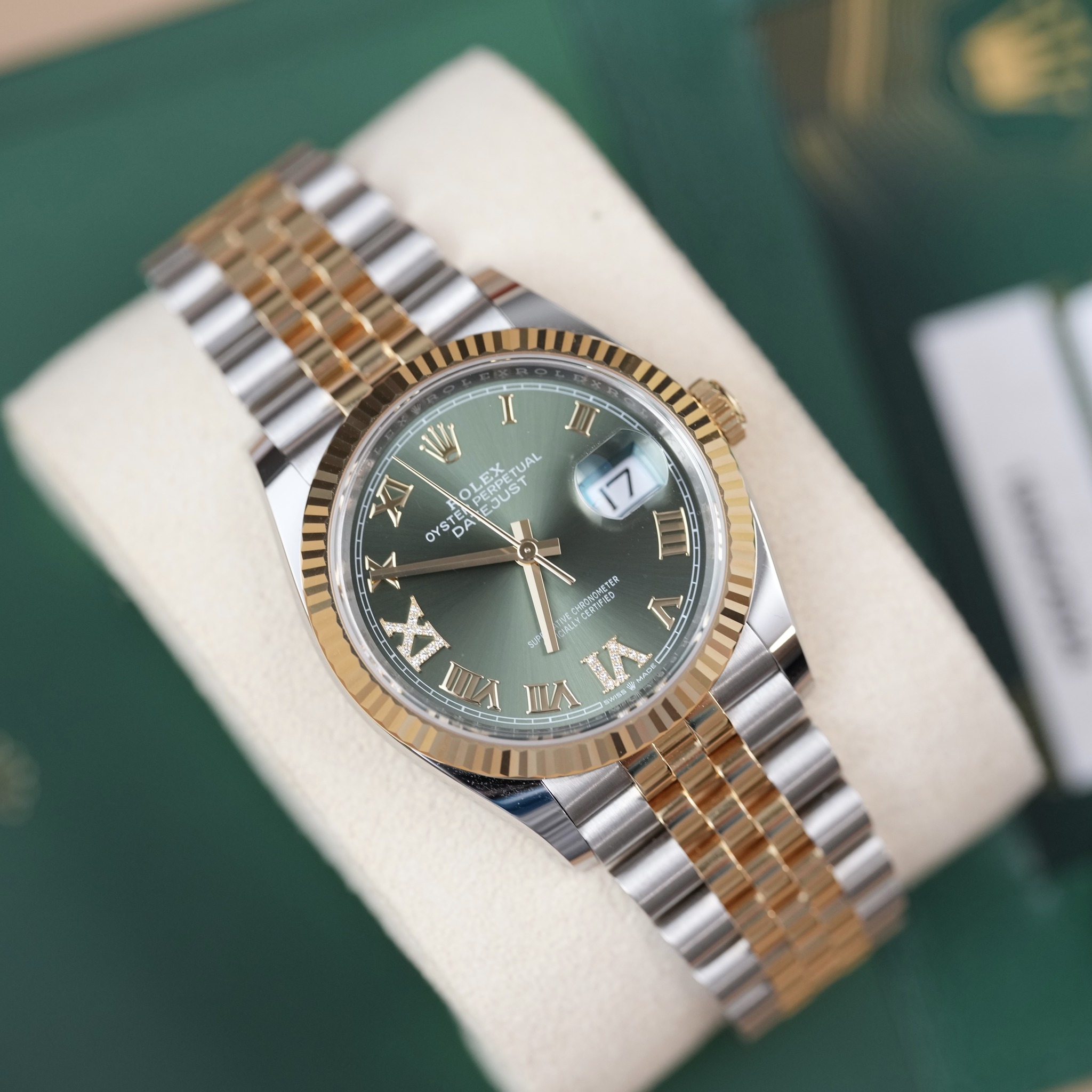 May be an image of wrist watch and text