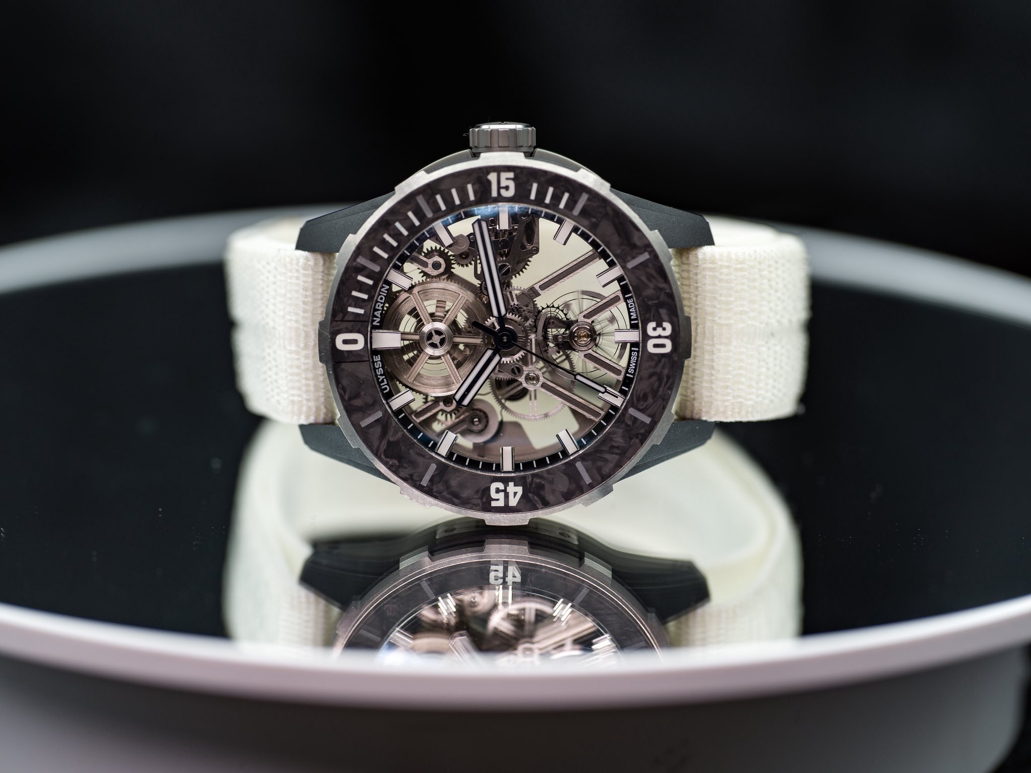 May be an image of wrist watch and text