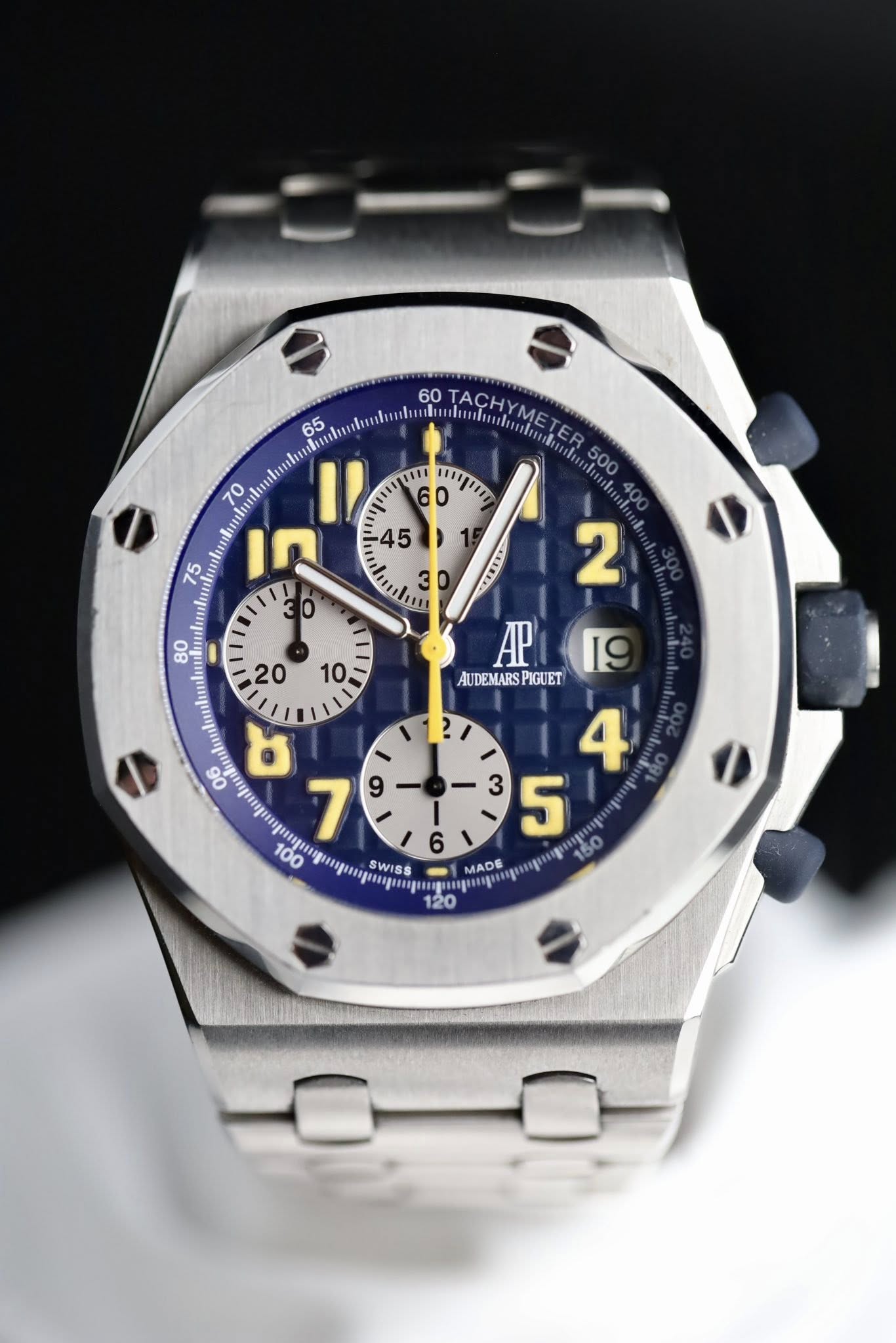 May be an image of wrist watch and text