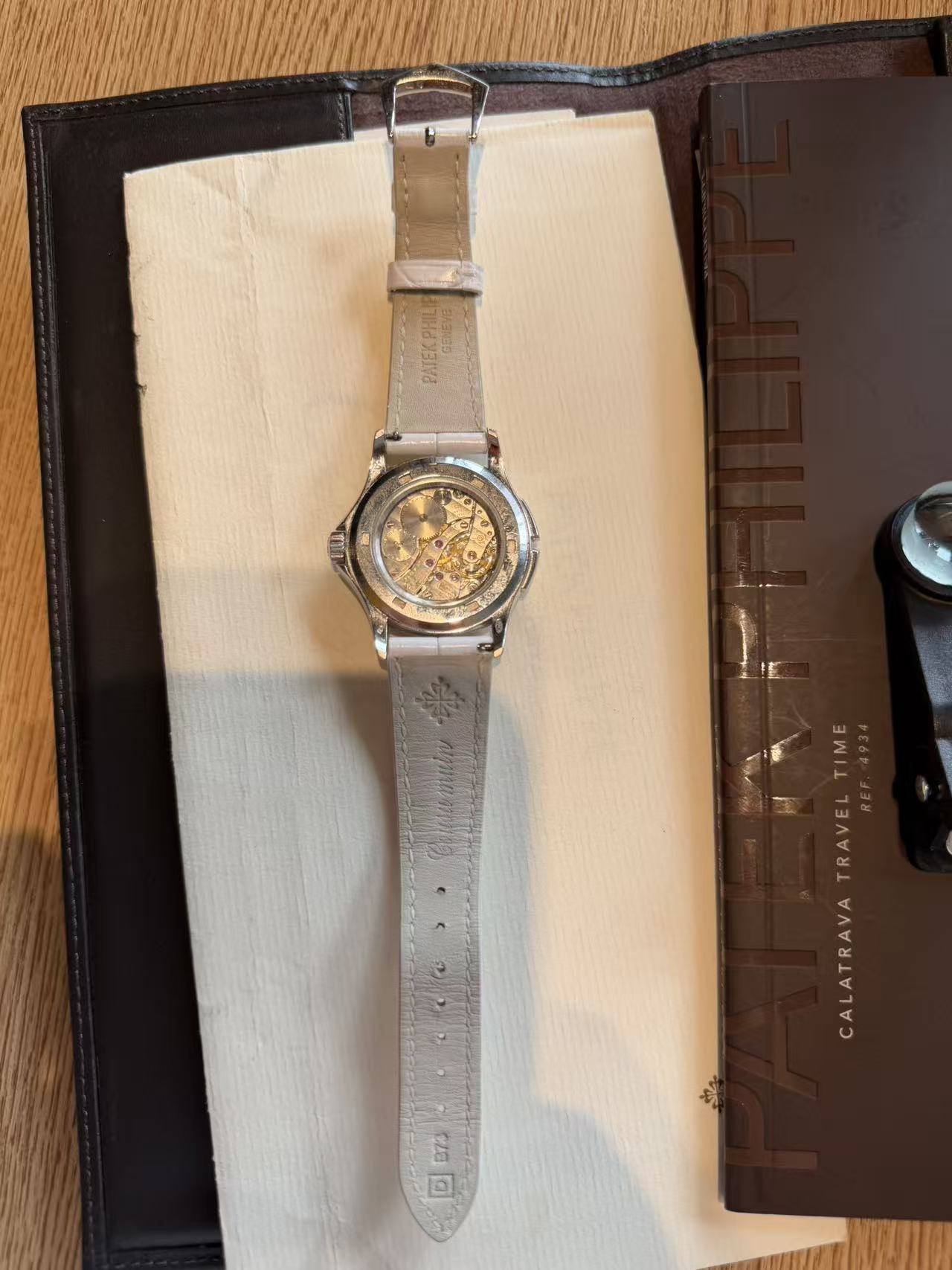 May be an image of digital watch and text