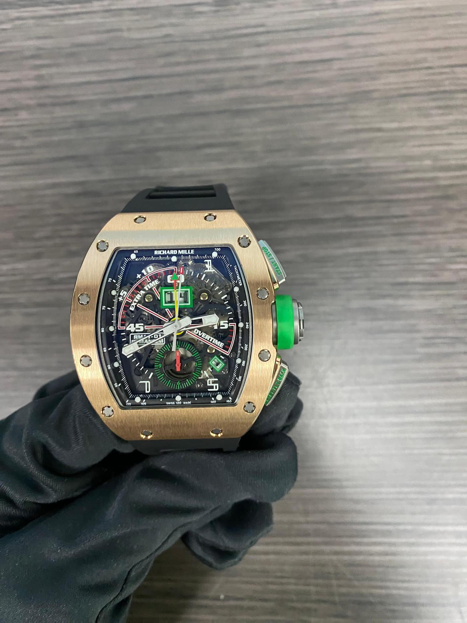 May be an image of wrist watch and text