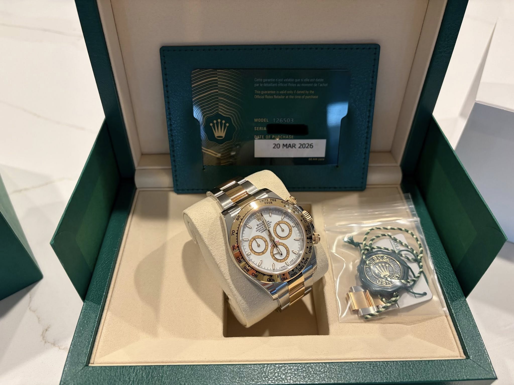 May be an image of wrist watch and text that says '20MAR2026 20 MAR 2026 CnT ج BNO កិ CEN'