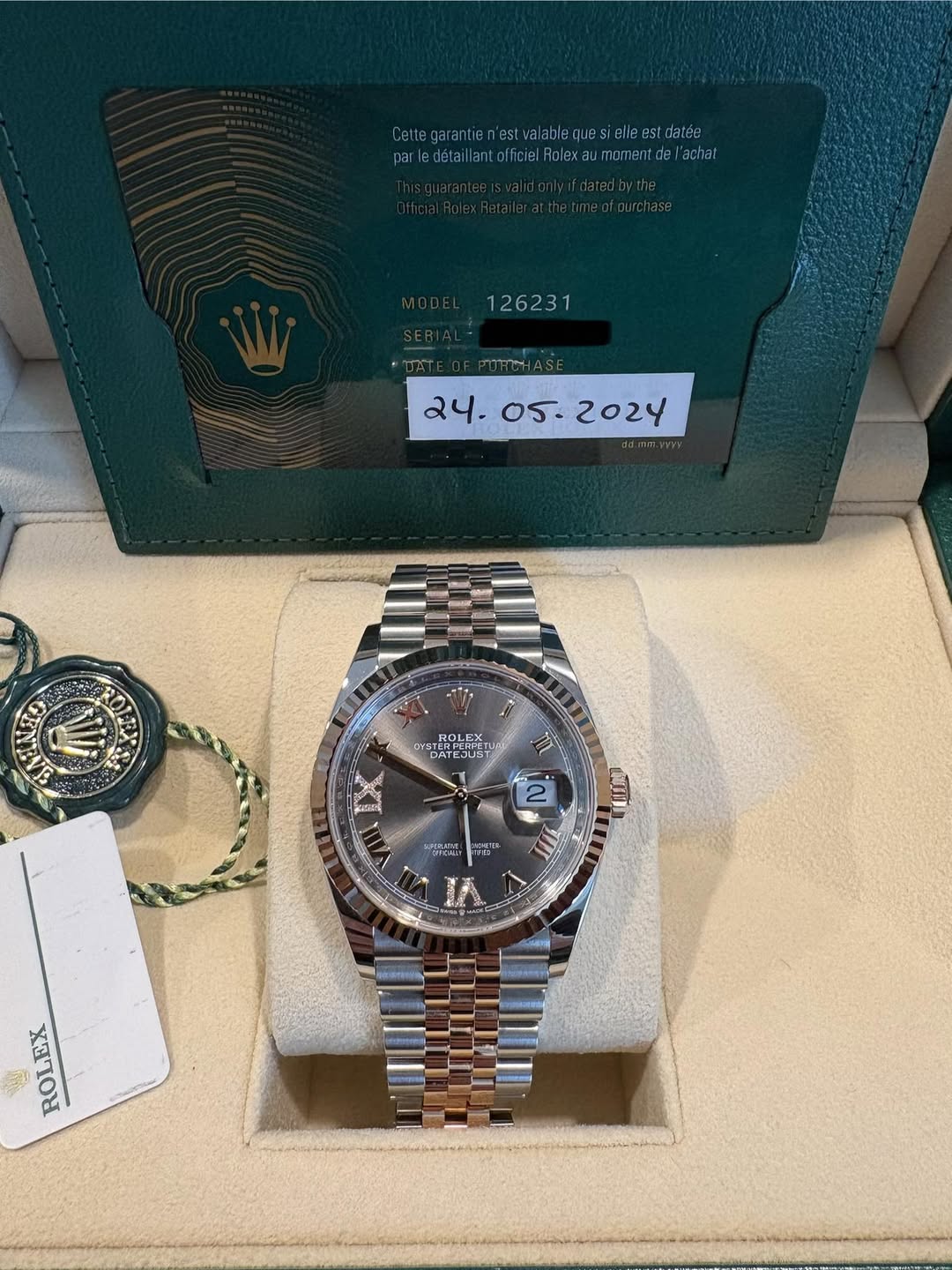 May be an image of wrist watch and text