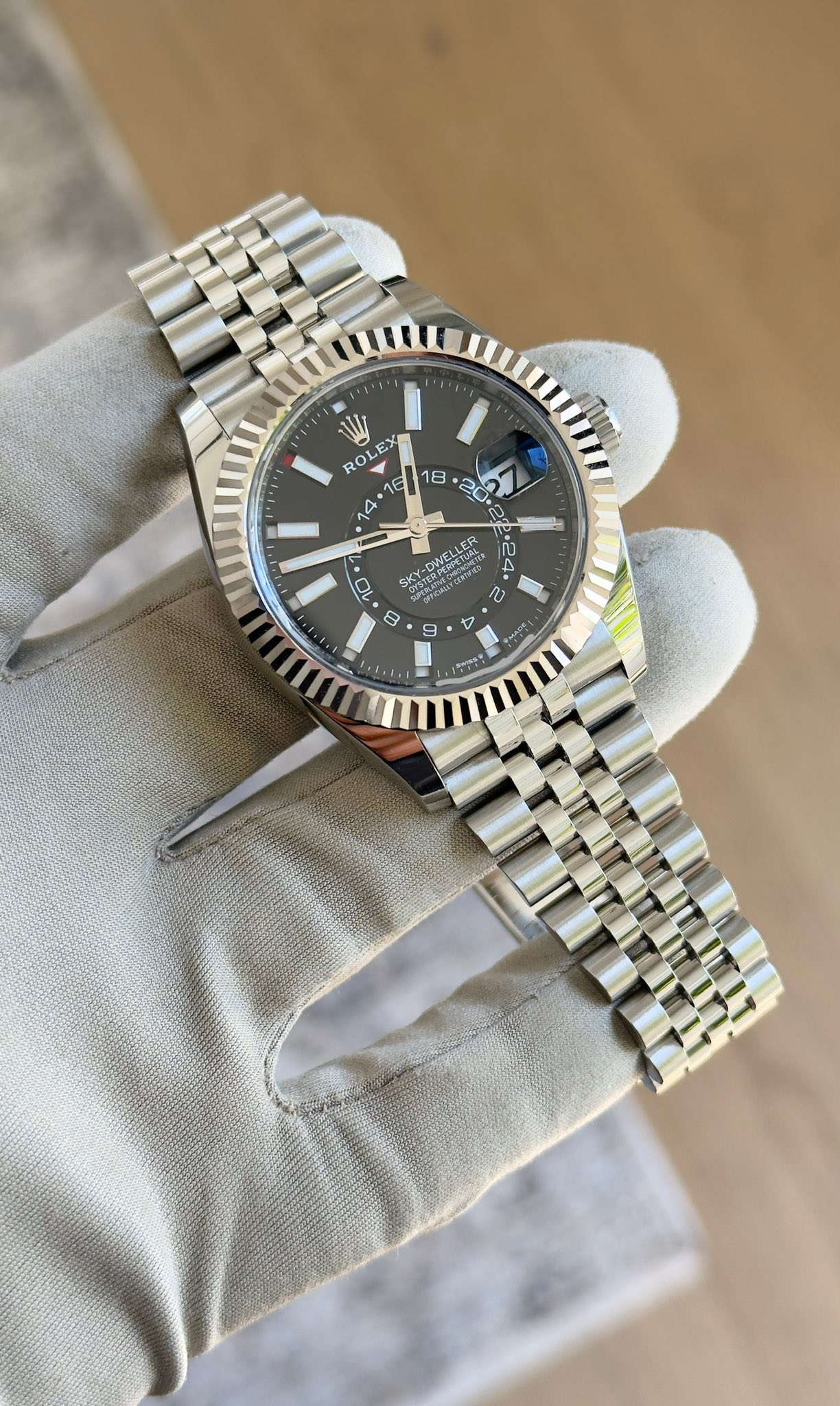 May be an image of wrist watch and text