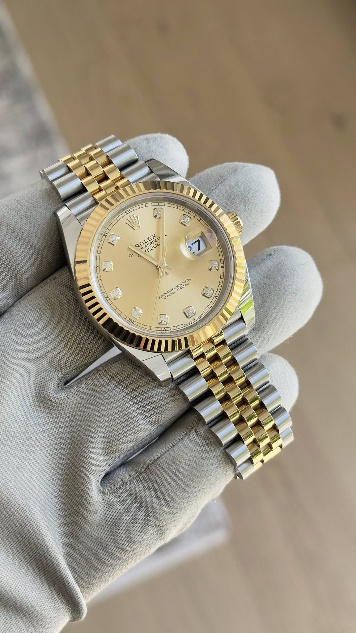 May be an image of wrist watch and text