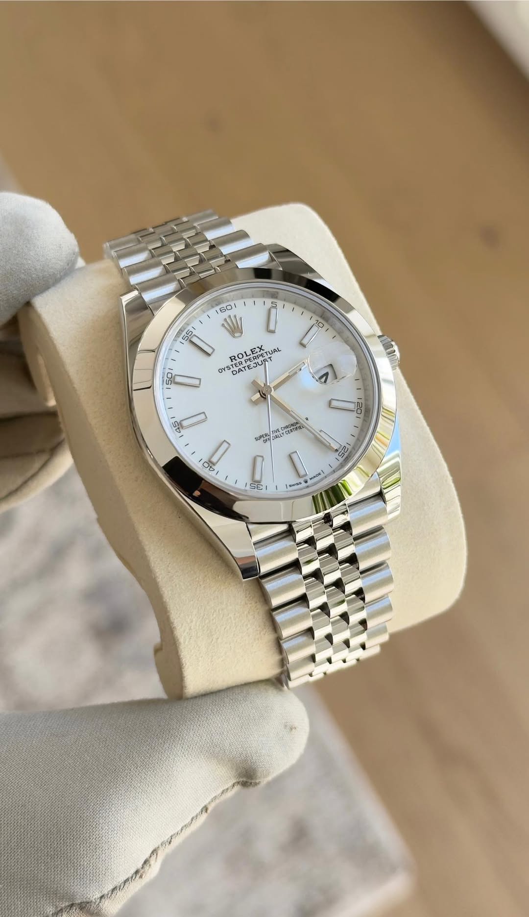 May be an image of wrist watch and text