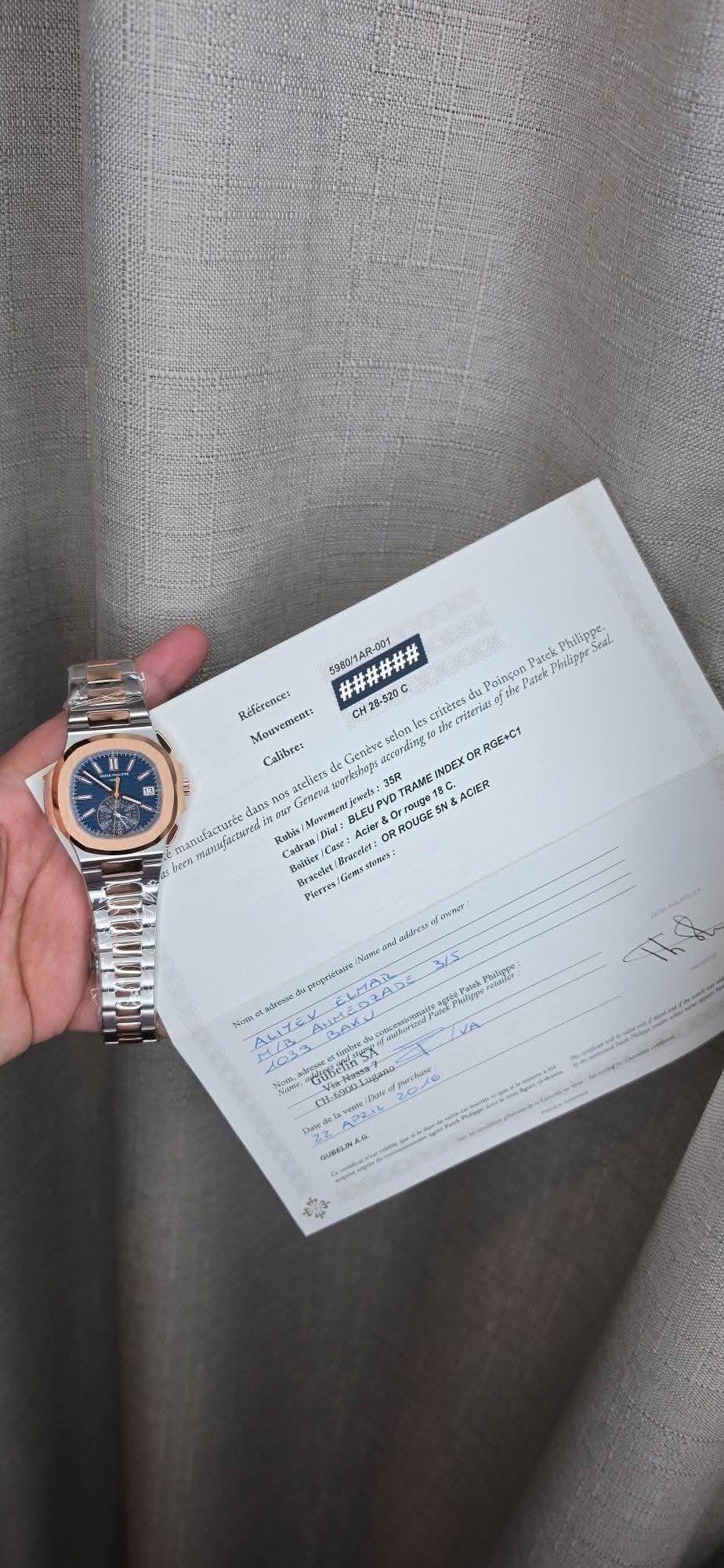 May be an image of wrist watch, ticket stub and text