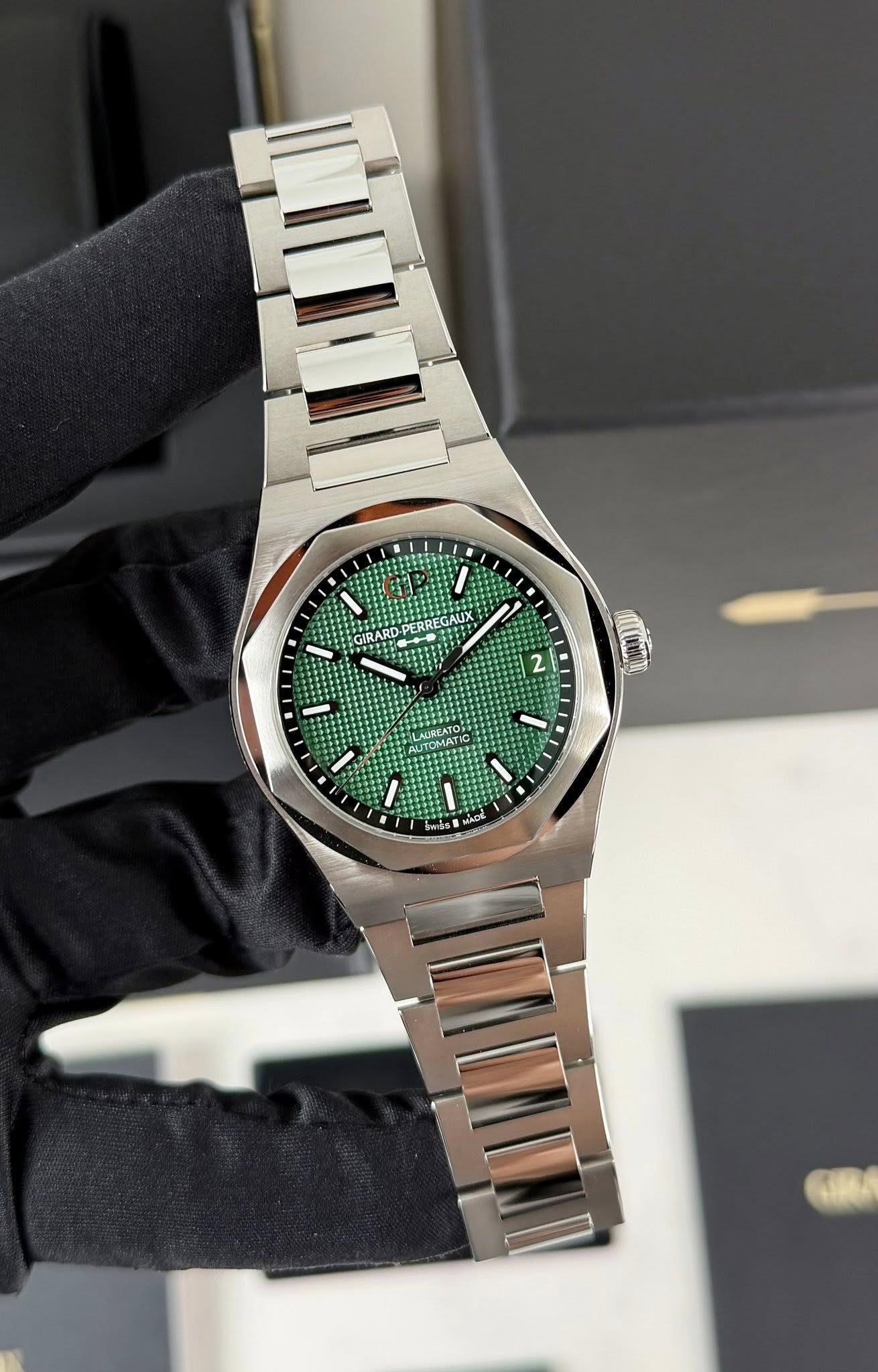 May be an image of wrist watch and text