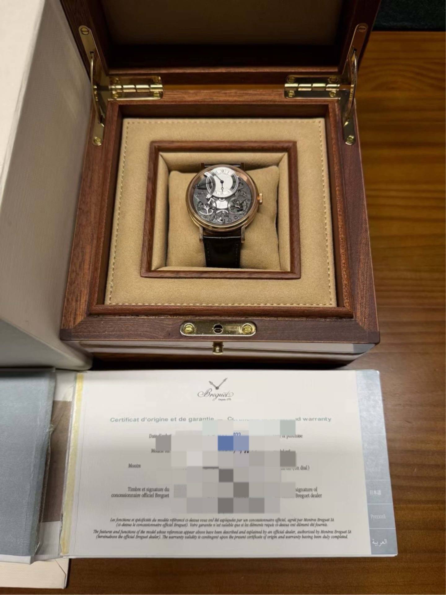 May be an image of wrist watch and text