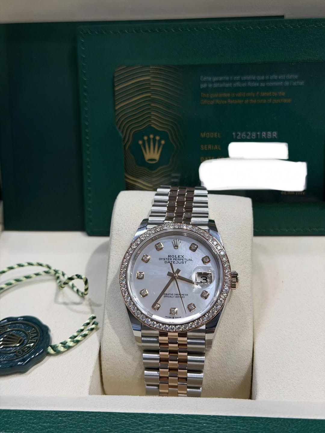 May be an image of wrist watch and text