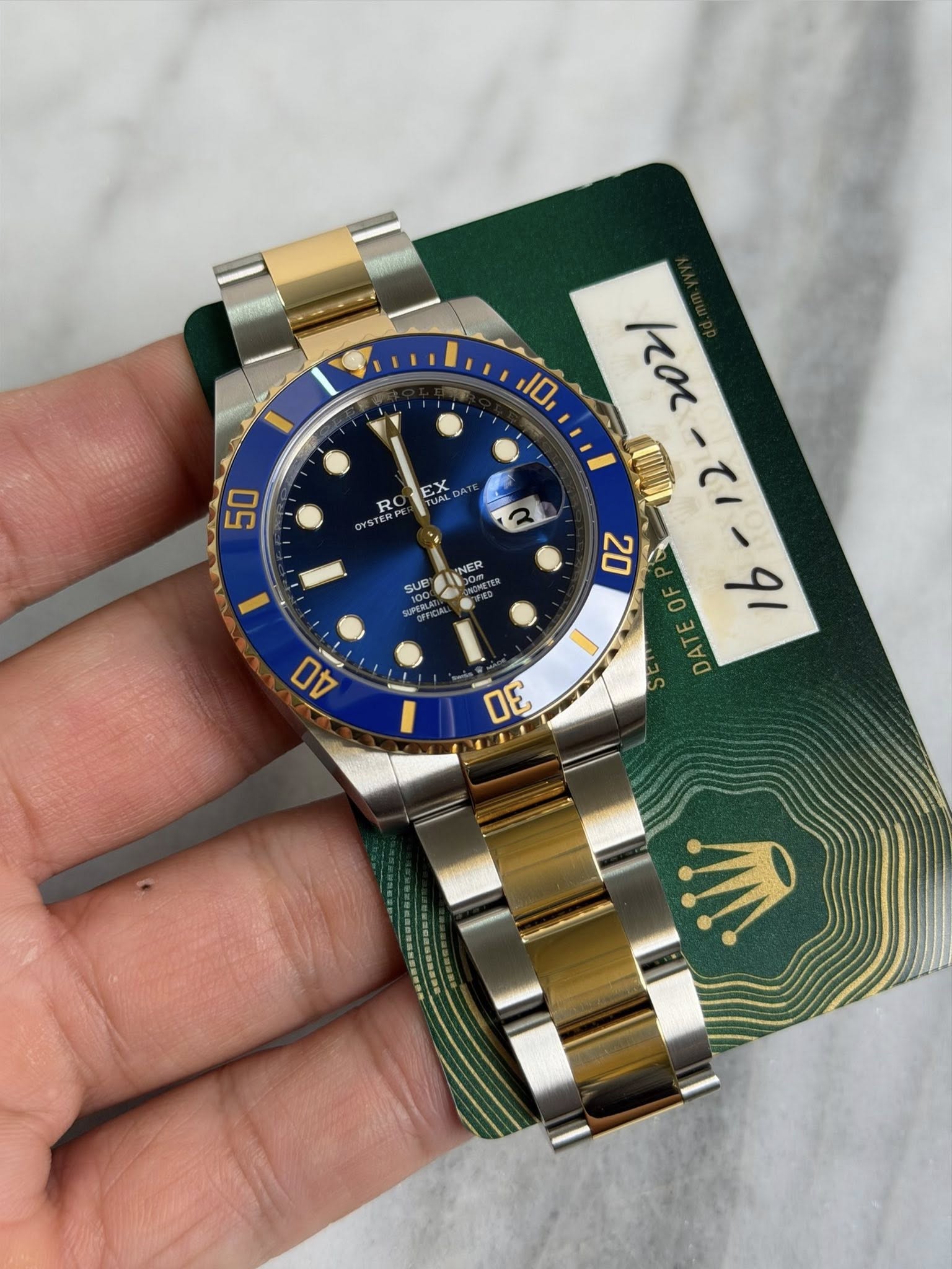 May be an image of wrist watch and text that says '10 EX A 50 RO OYSTER SUB LNNER N SUPMITCA hear 2 0 ーてー てー9! ح 91 A to 40 DE'