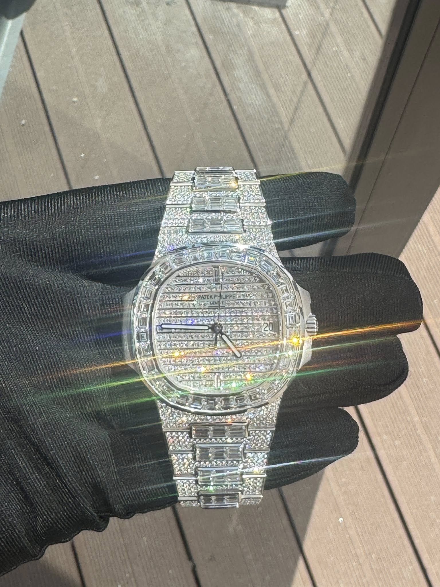 May be an image of wrist watch and text