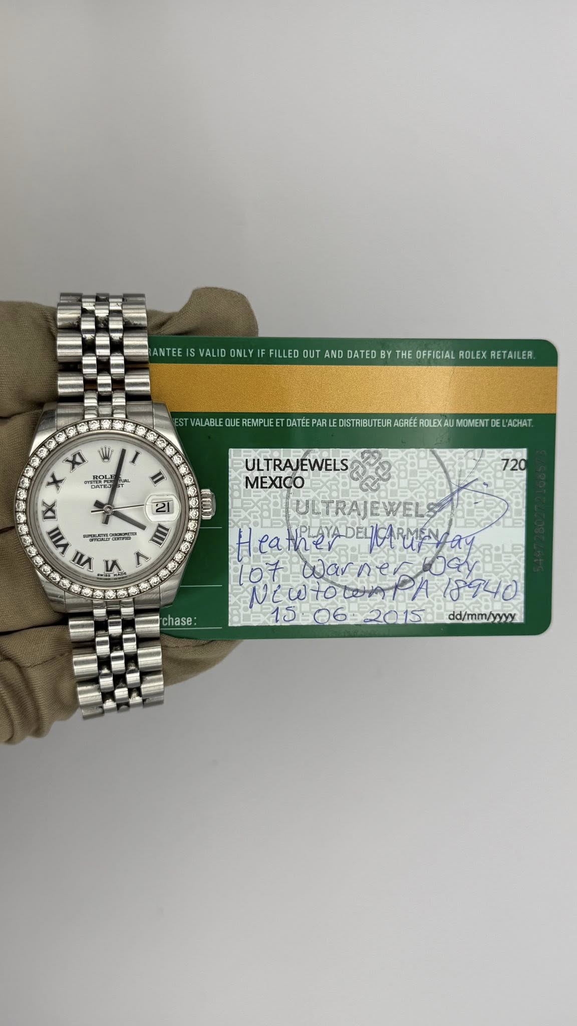 May be an image of wrist watch and text
