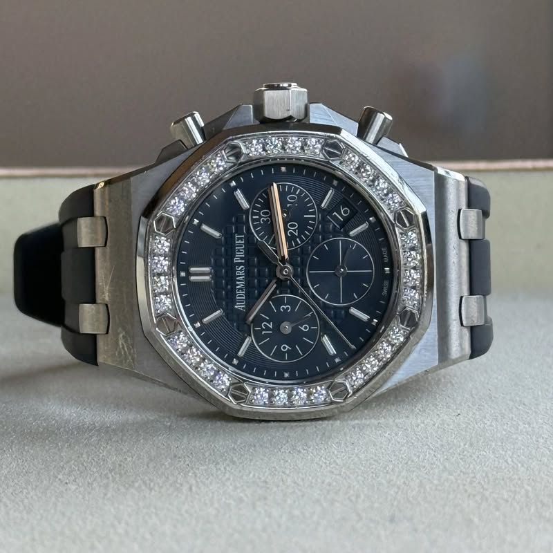 May be an image of wrist watch and text