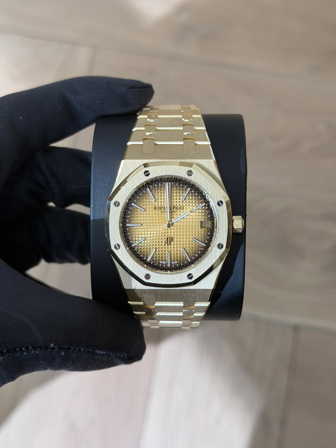 May be an image of wrist watch and text