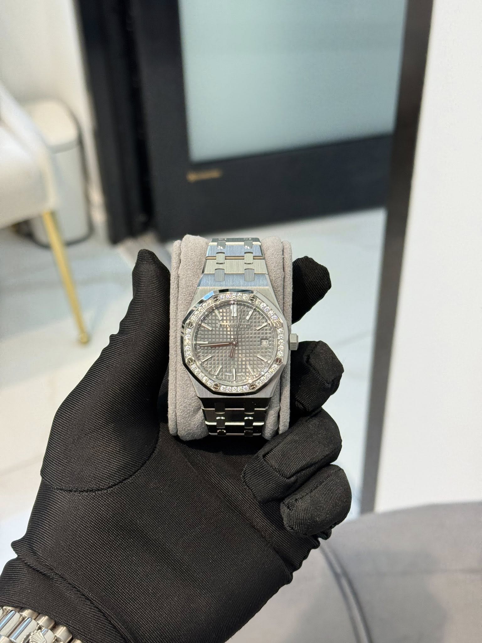 May be an image of wrist watch and text