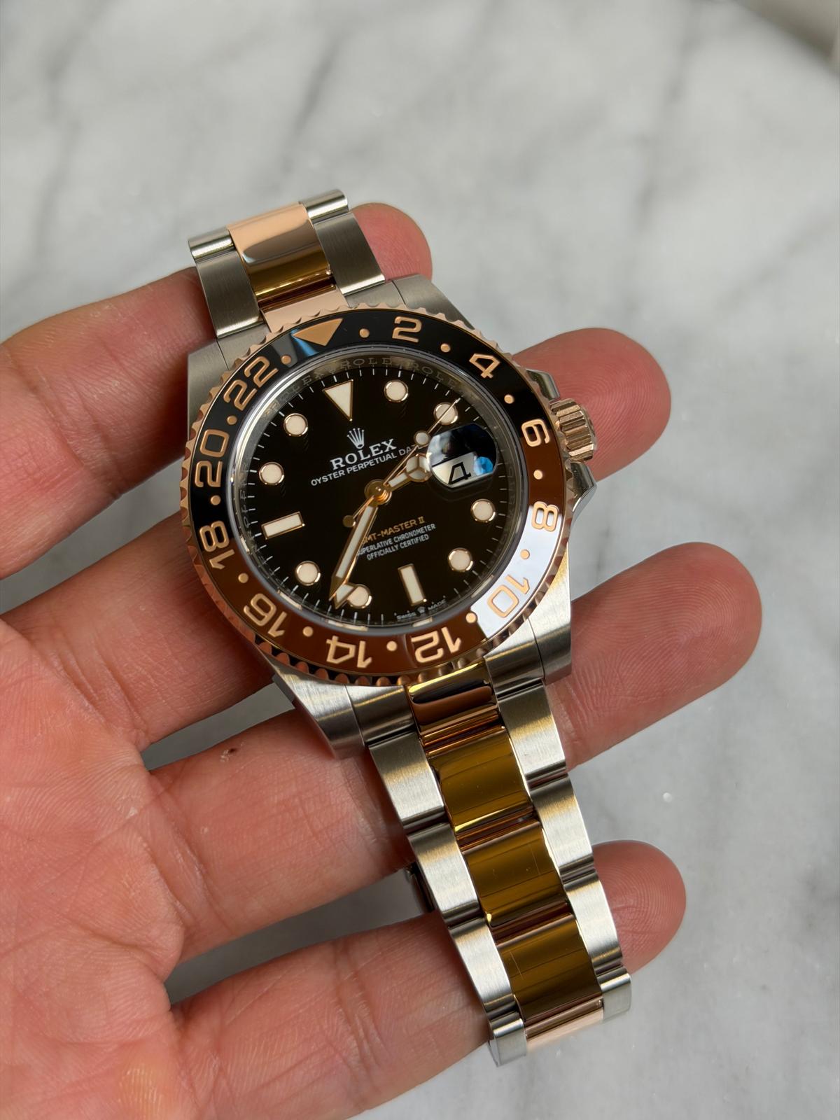 May be an image of wrist watch and text that says '.20.22 ROLEX ROEPEETUAL PERPETUA YST STRRPERPETU 8 CO 0 I C カ 己'