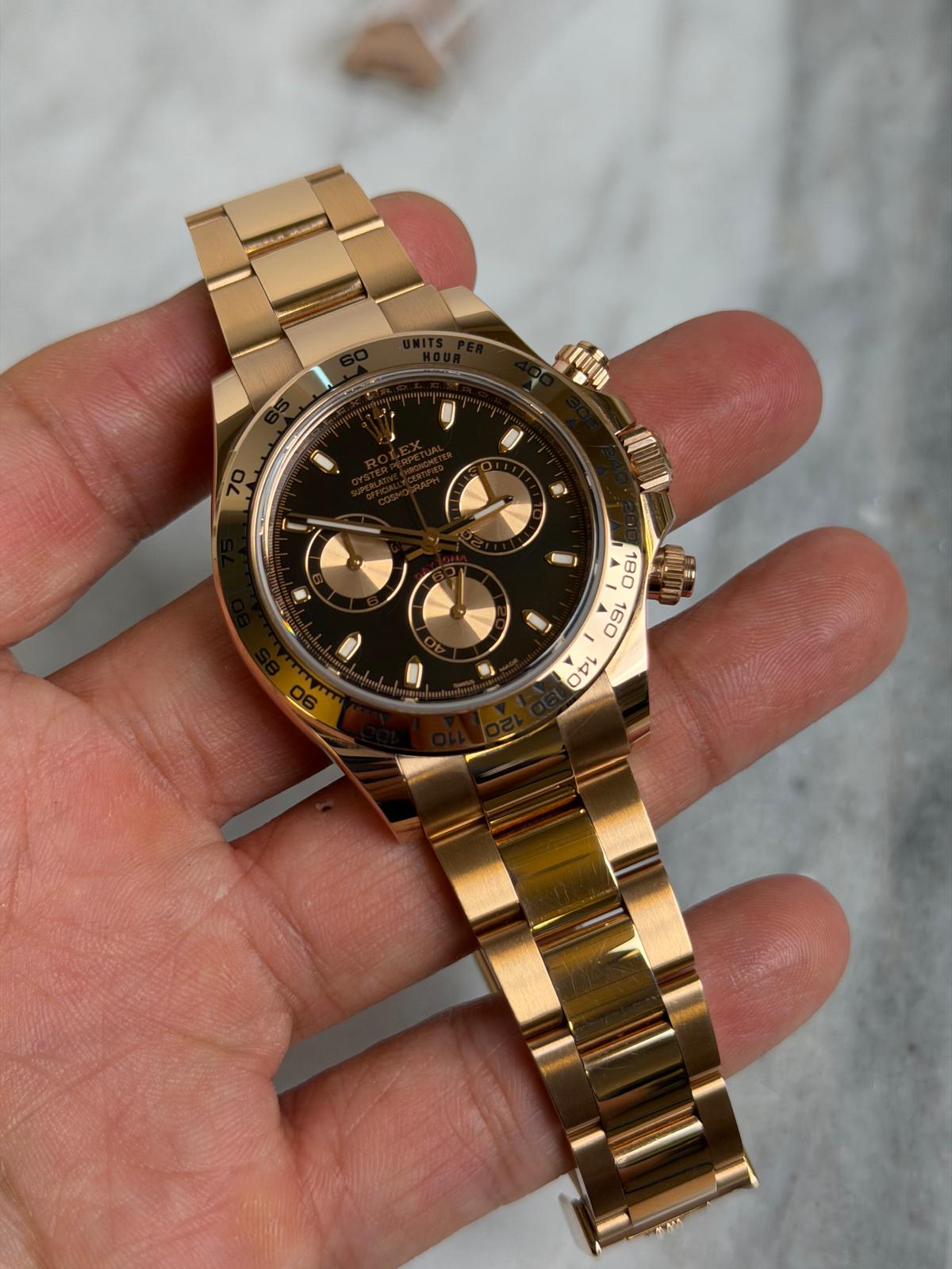 May be an image of wrist watch and text