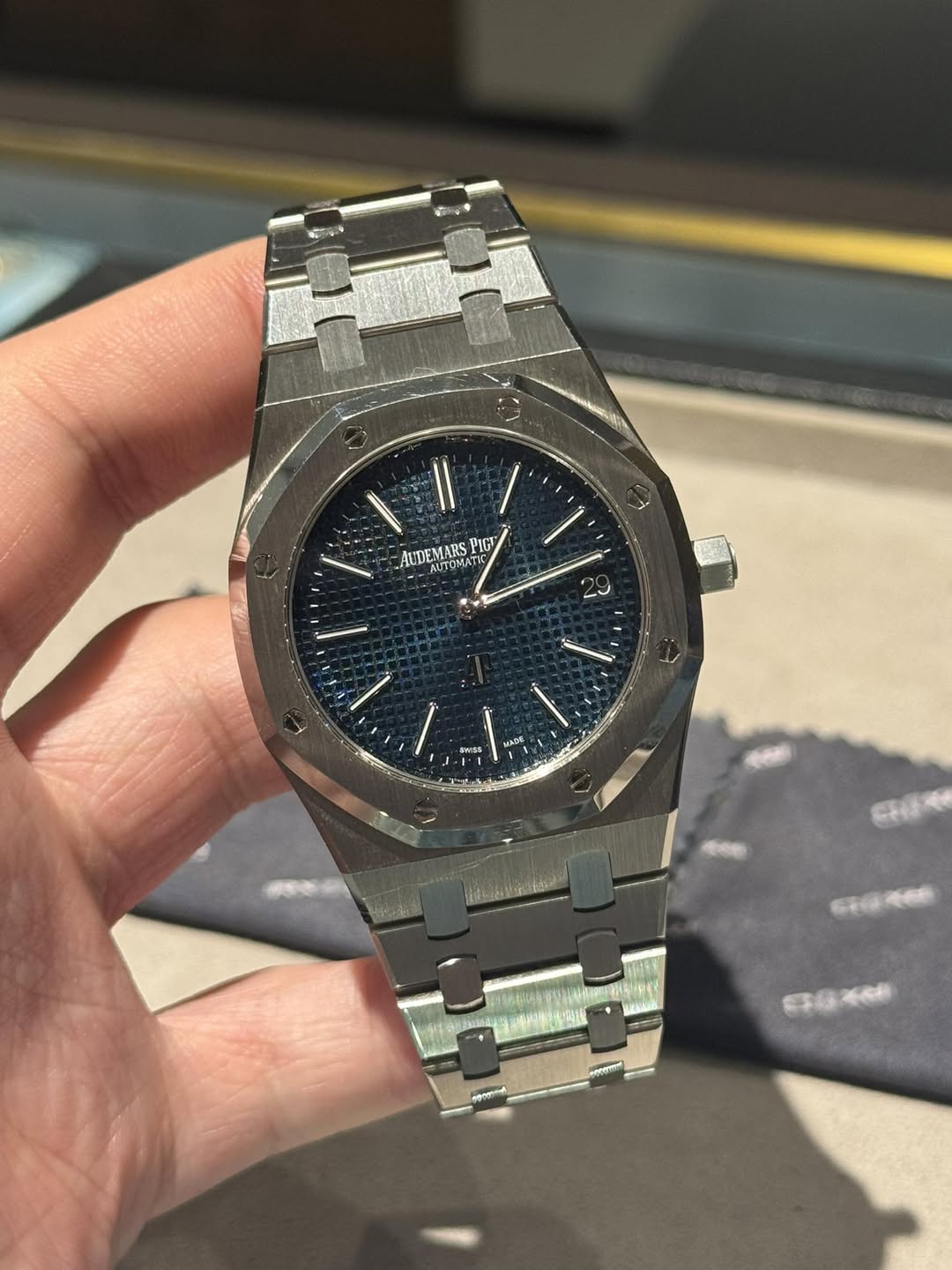 May be an image of wrist watch and text