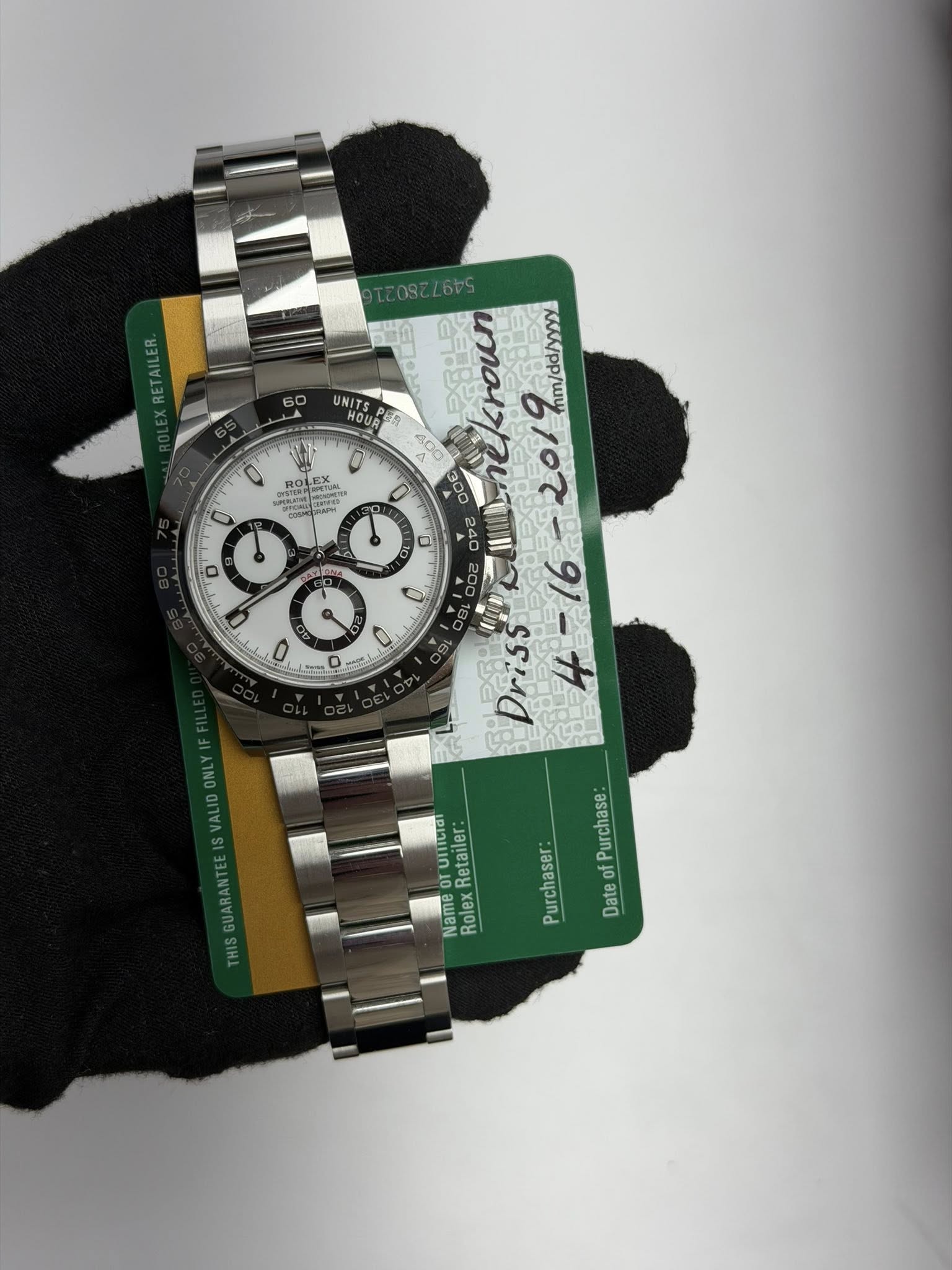 May be an image of wrist watch and text