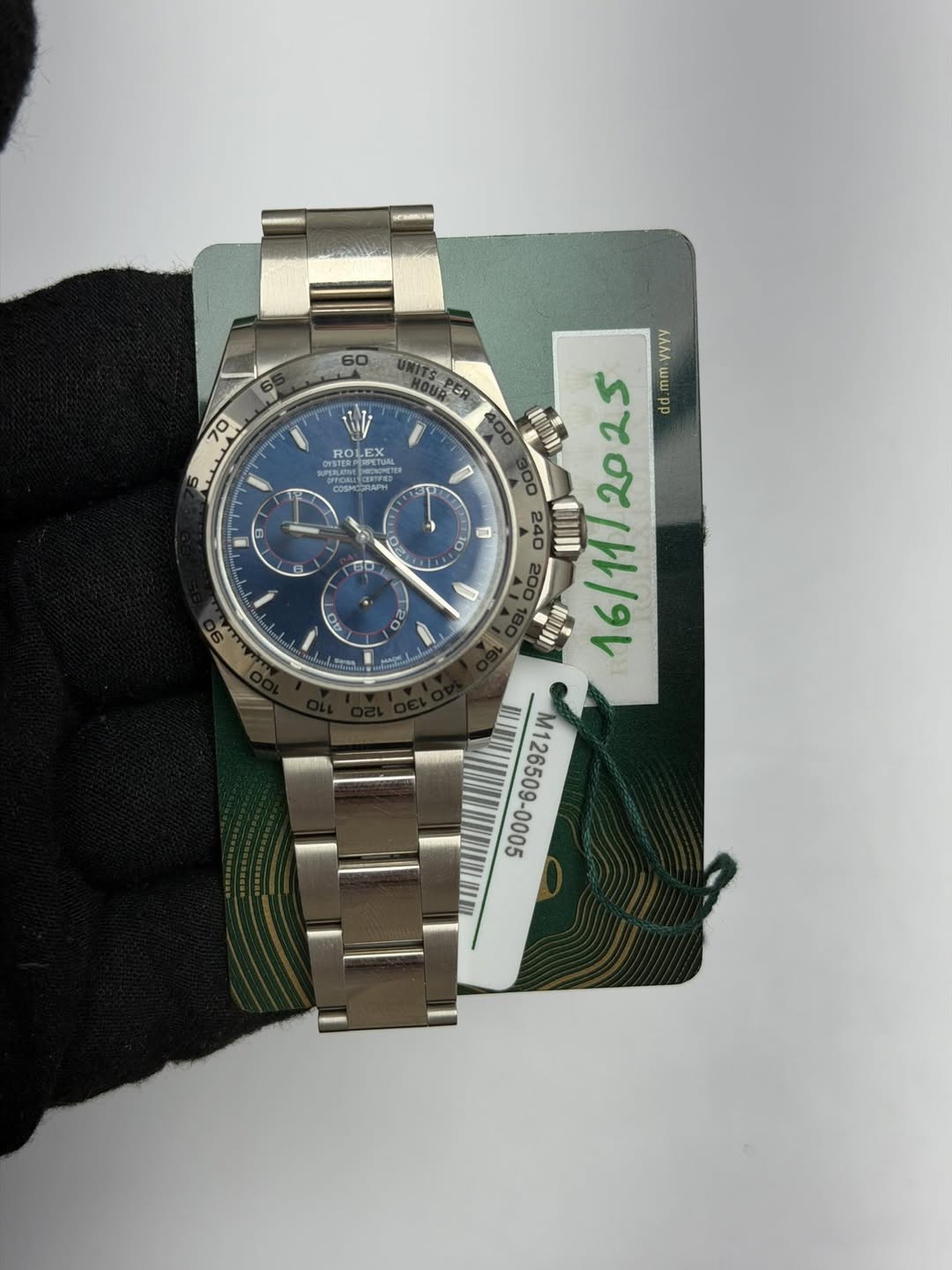 May be an image of wrist watch and text
