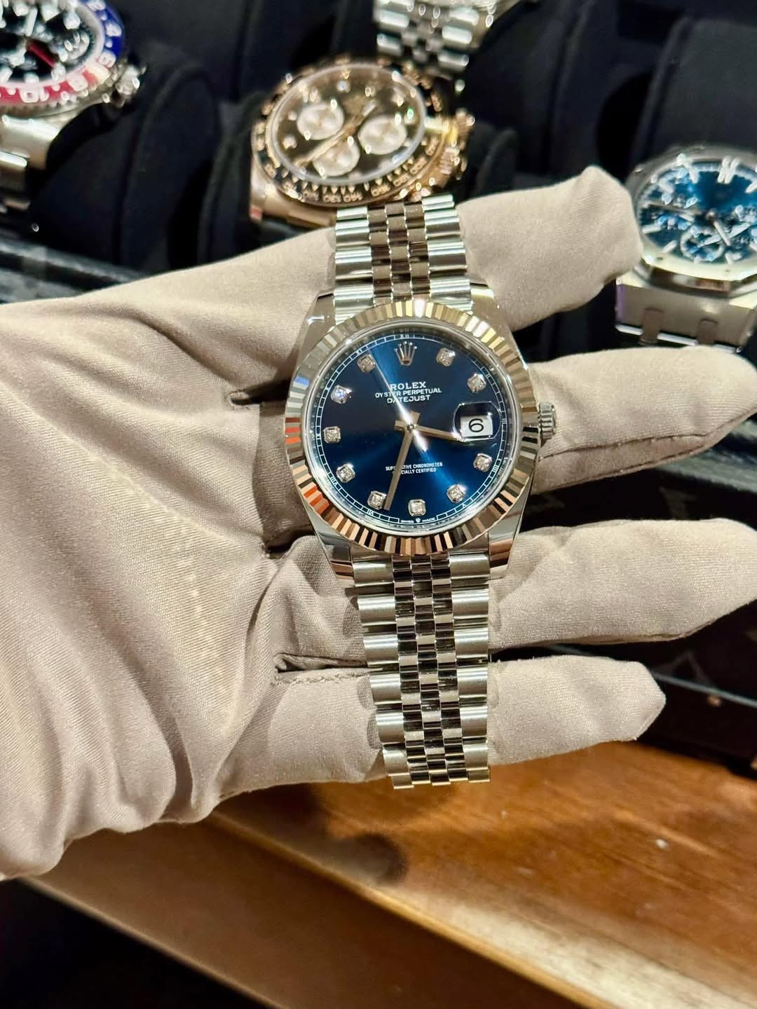 May be an image of wrist watch and text