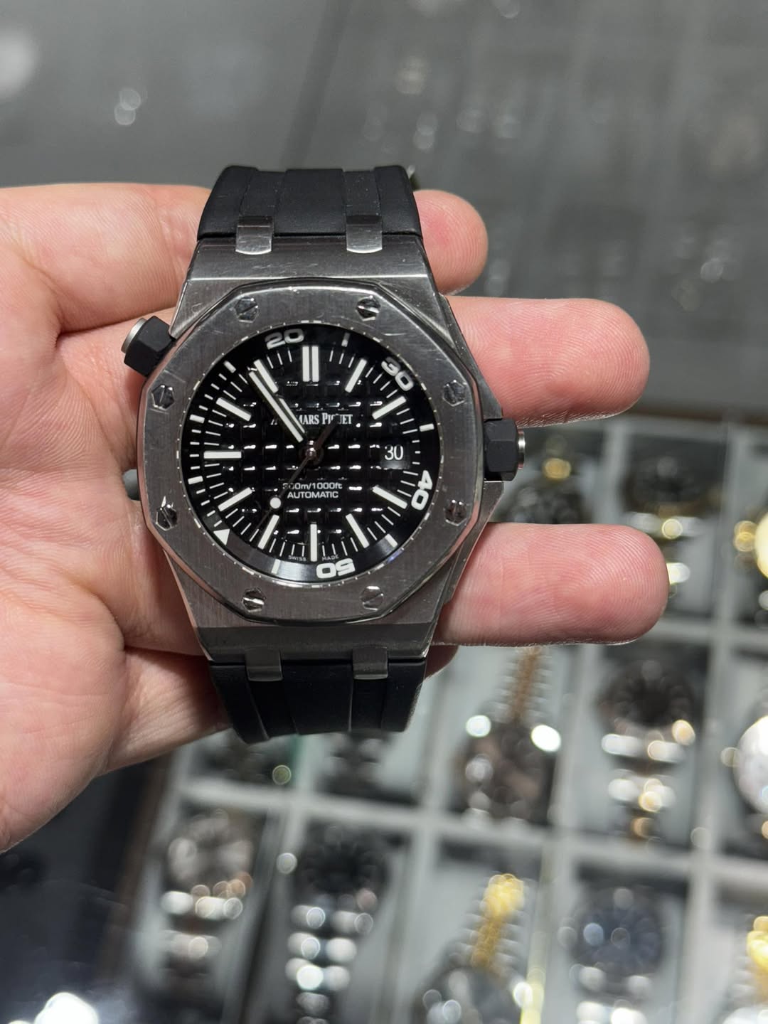 May be an image of wrist watch and text