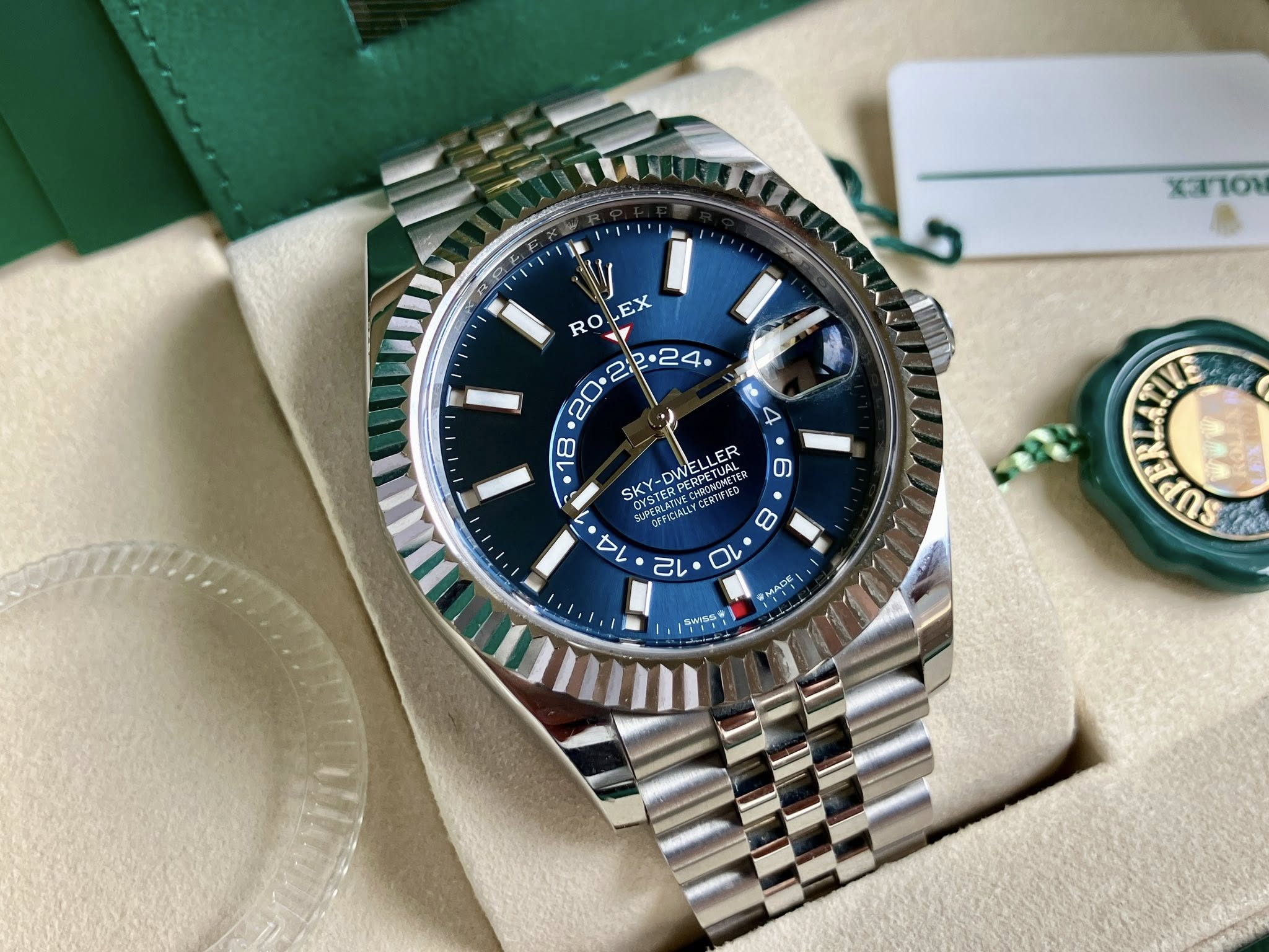 May be an image of wrist watch and text
