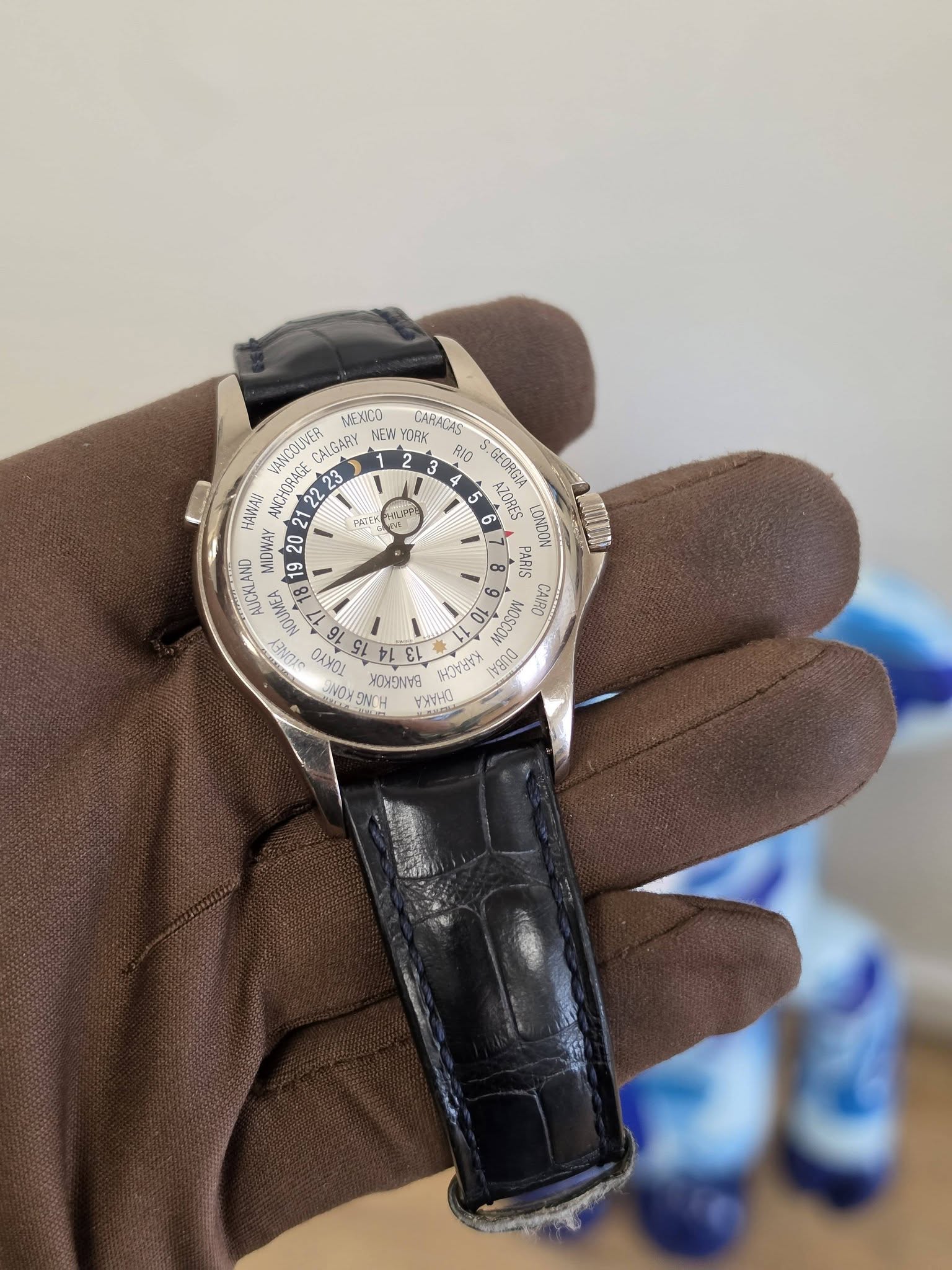 May be an image of wrist watch and text