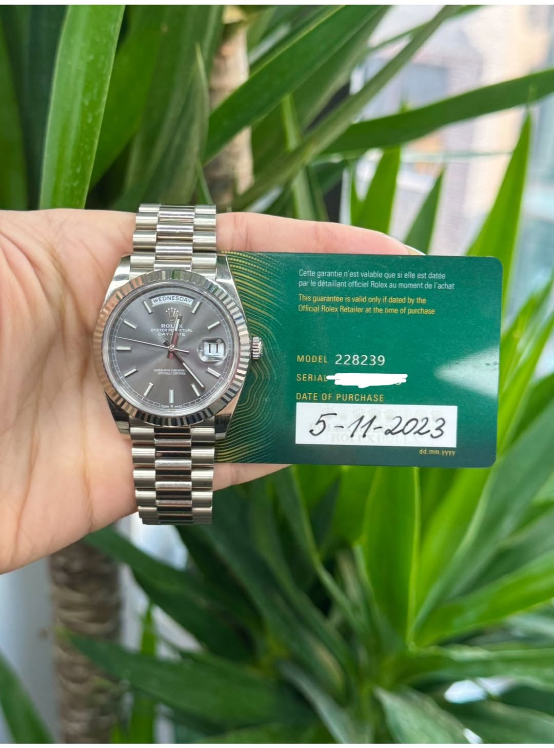 May be an image of wrist watch and text