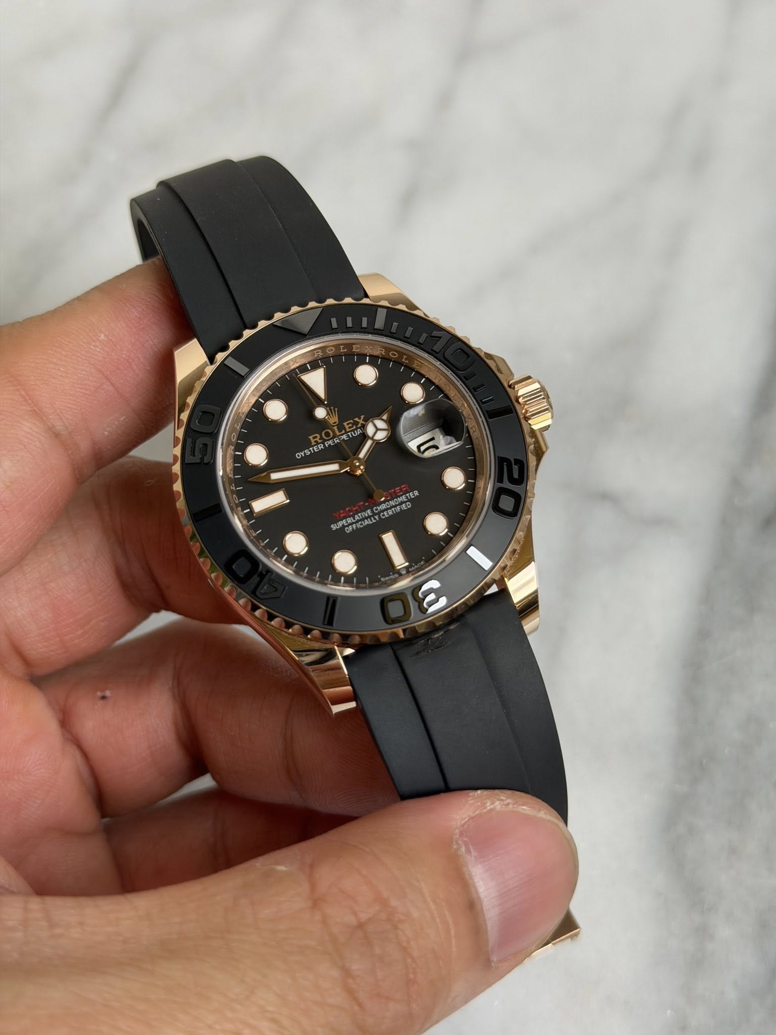 May be an image of wrist watch and text
