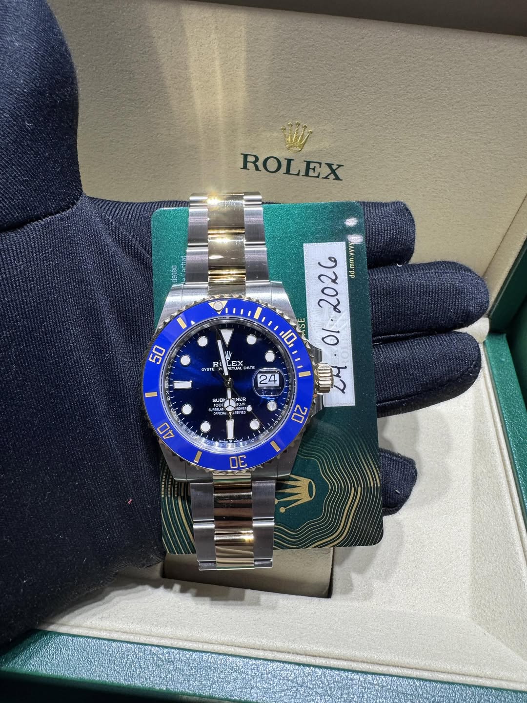 May be an image of wrist watch and text
