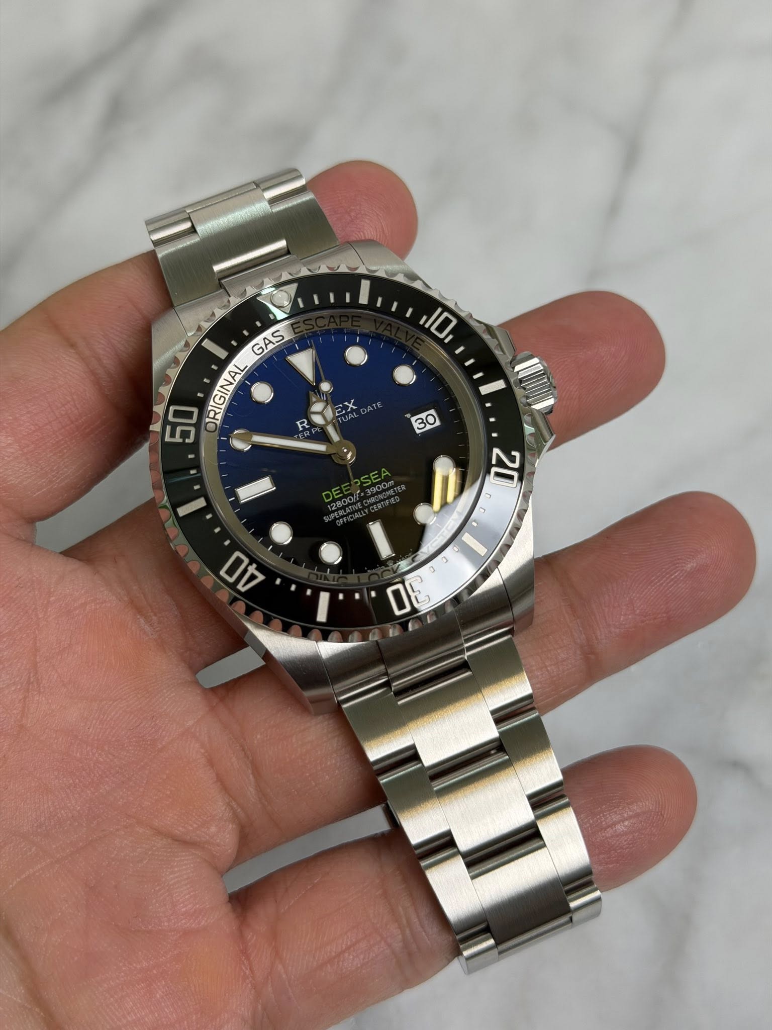 May be an image of wrist watch and text that says '10 GAS 50 RIGINAL RIGINAL R '
