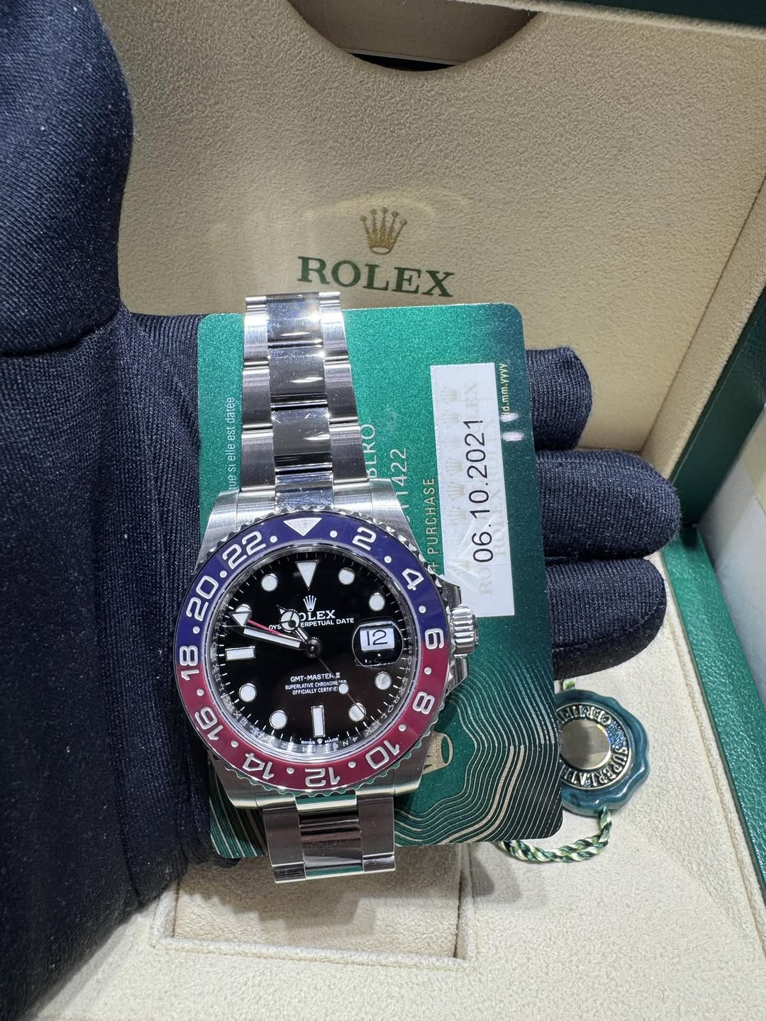 May be an image of wrist watch and text