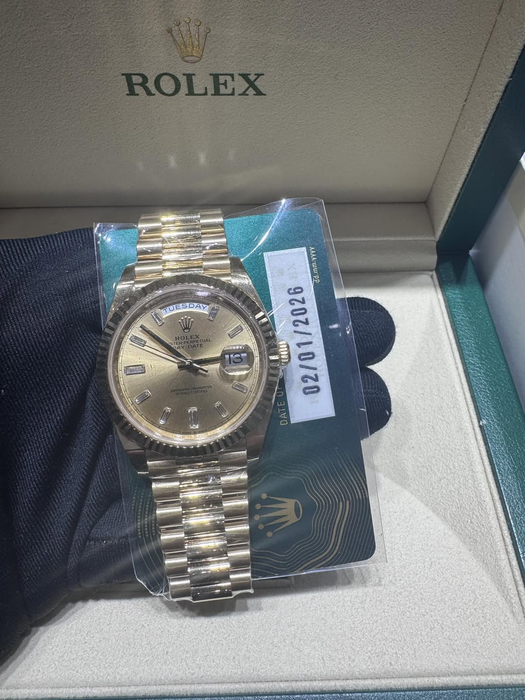 May be an image of wrist watch and text