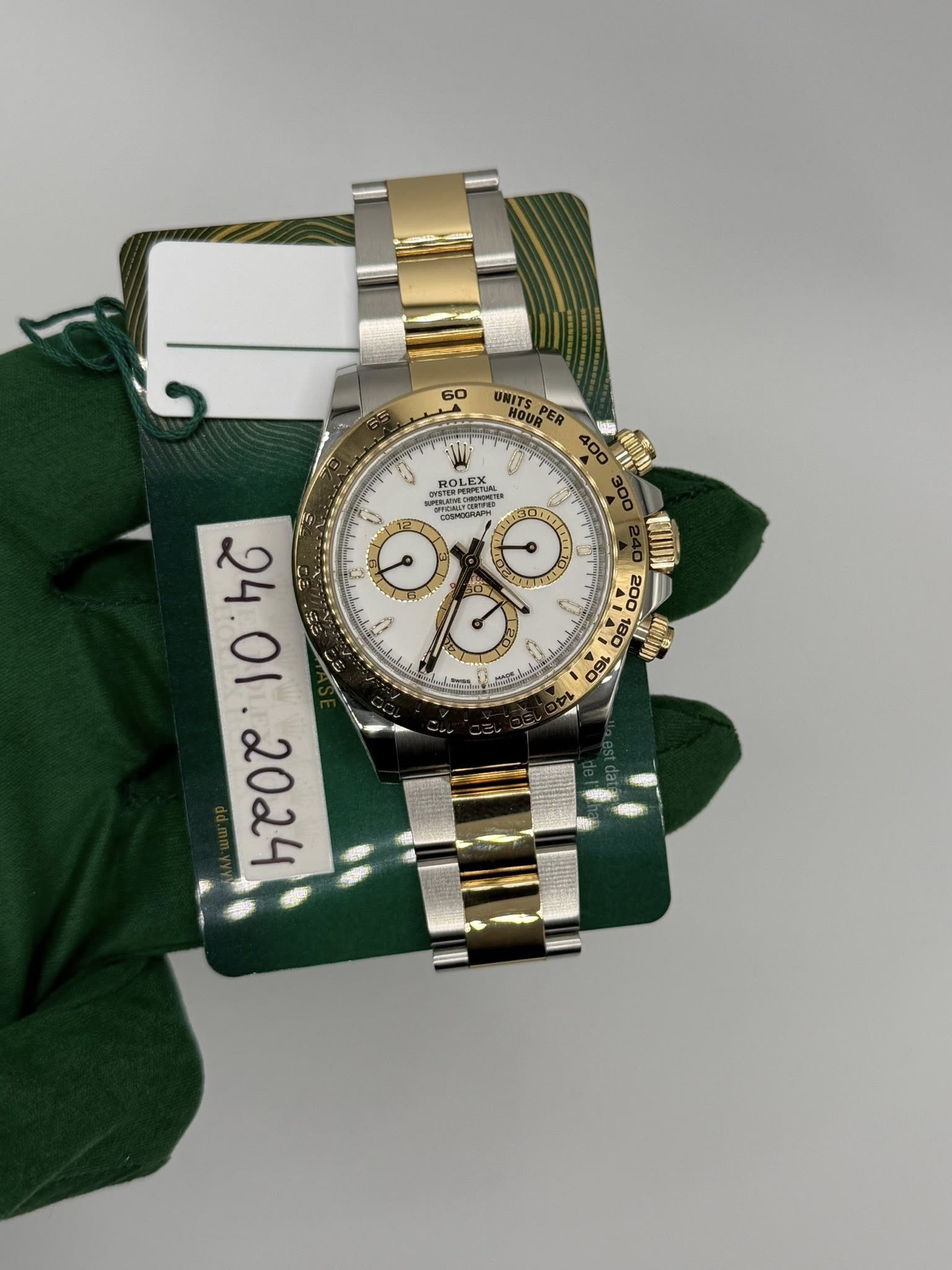 May be an image of wrist watch and text