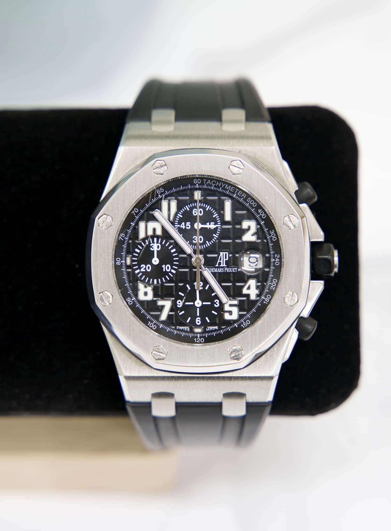 May be an image of wrist watch and text