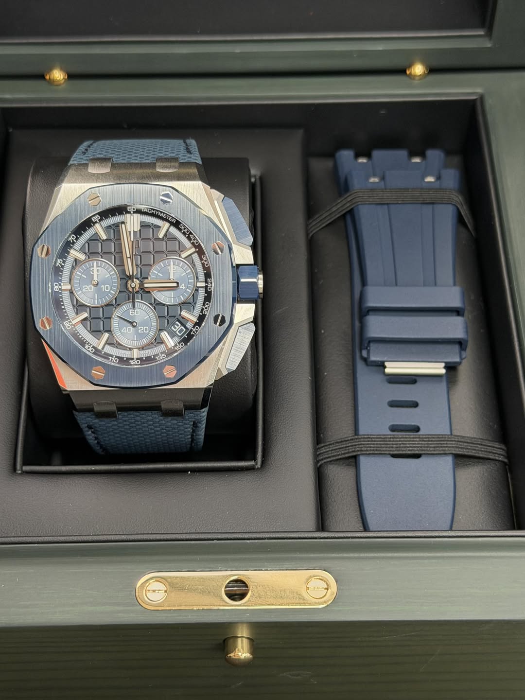 May be an image of wrist watch and text