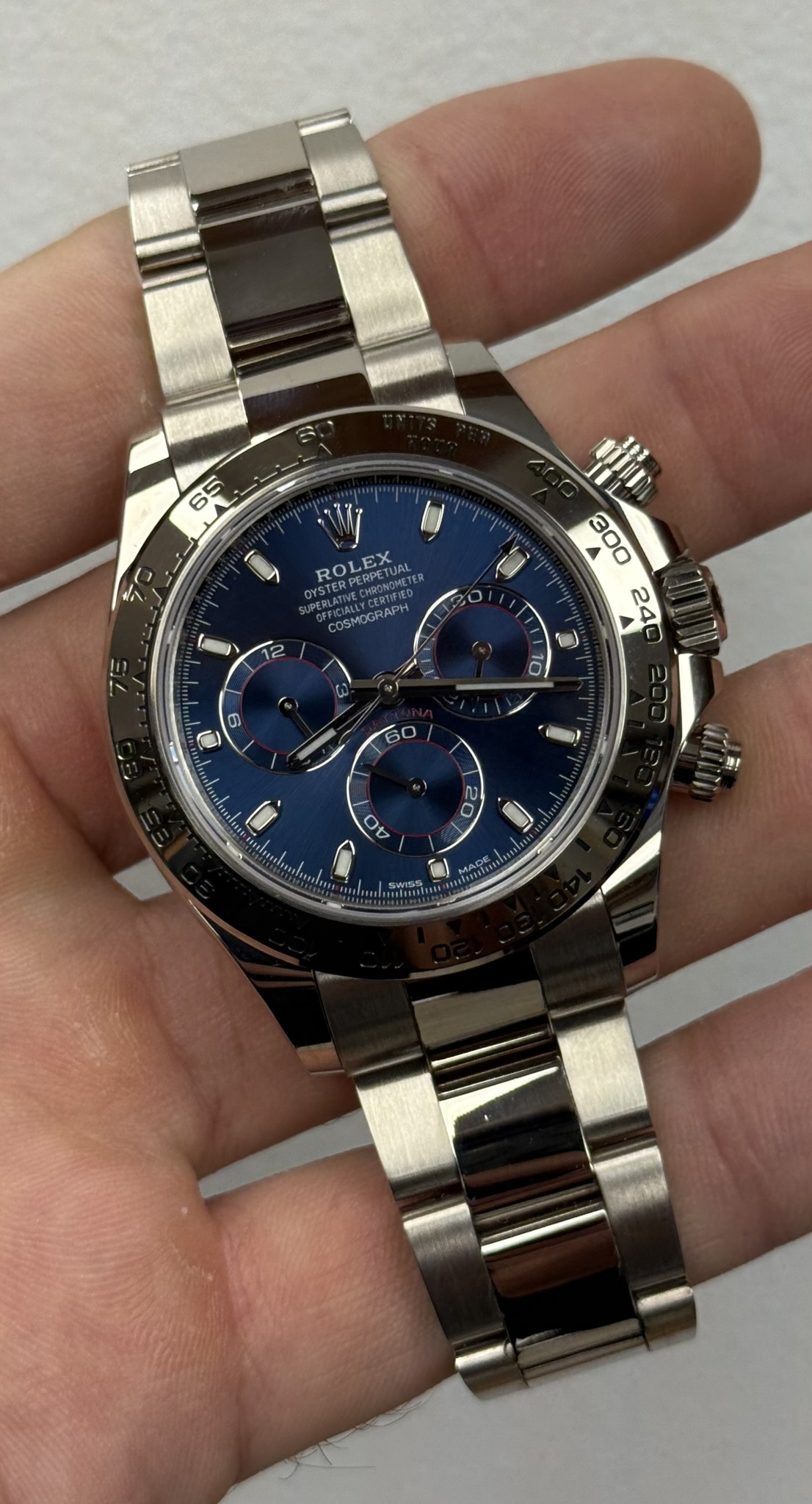 May be an image of wrist watch and text