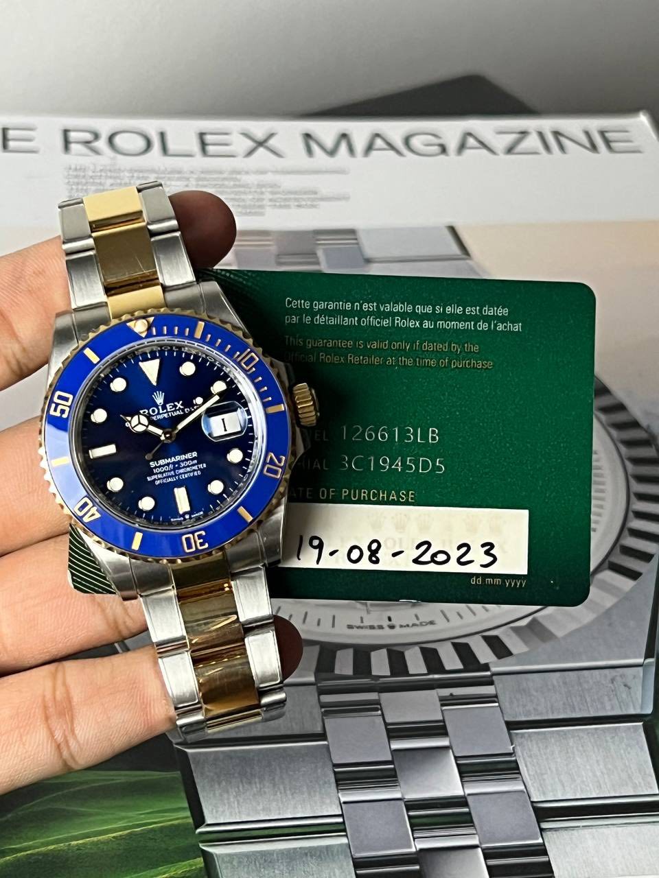 May be an image of wrist watch and text