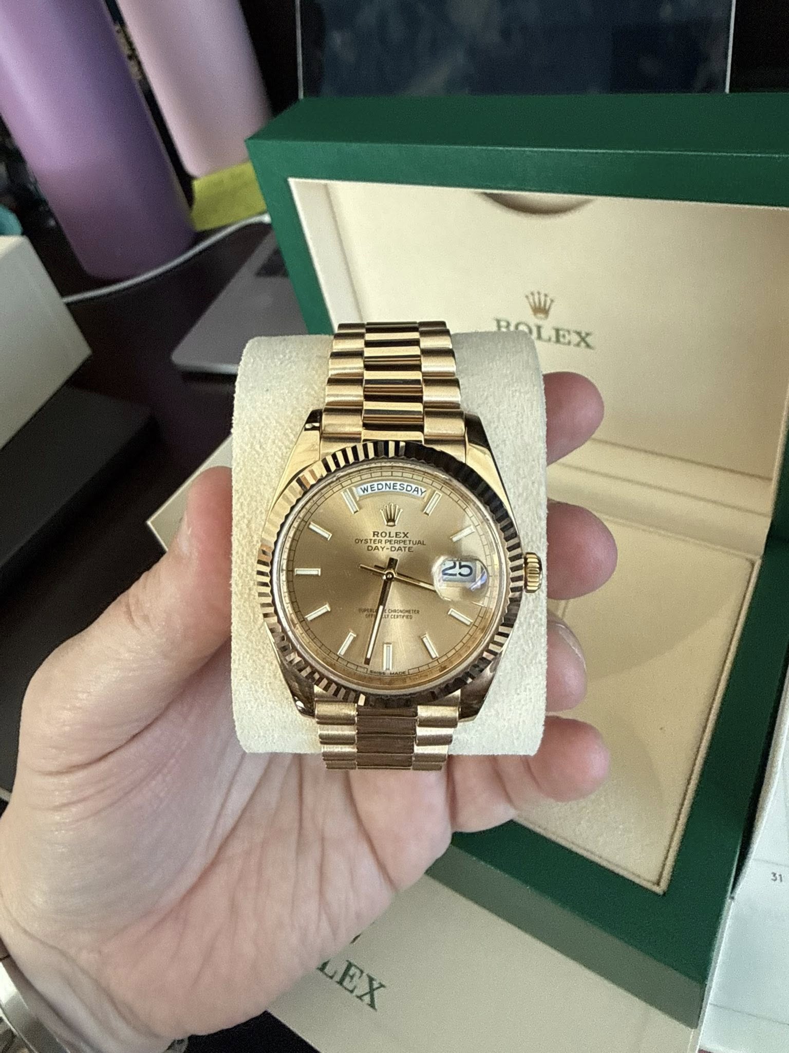 May be an image of wrist watch and text