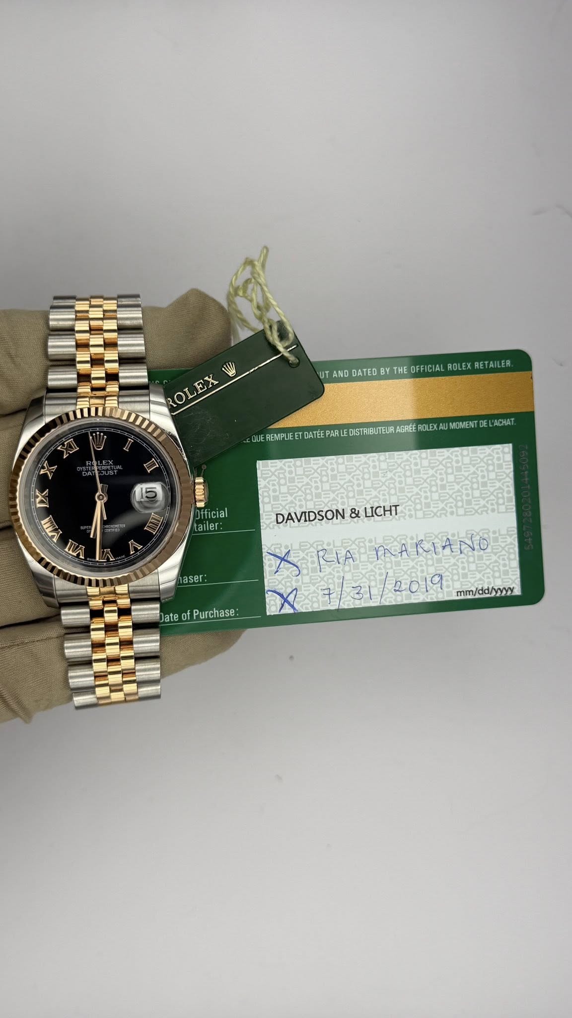 May be an image of wrist watch and text