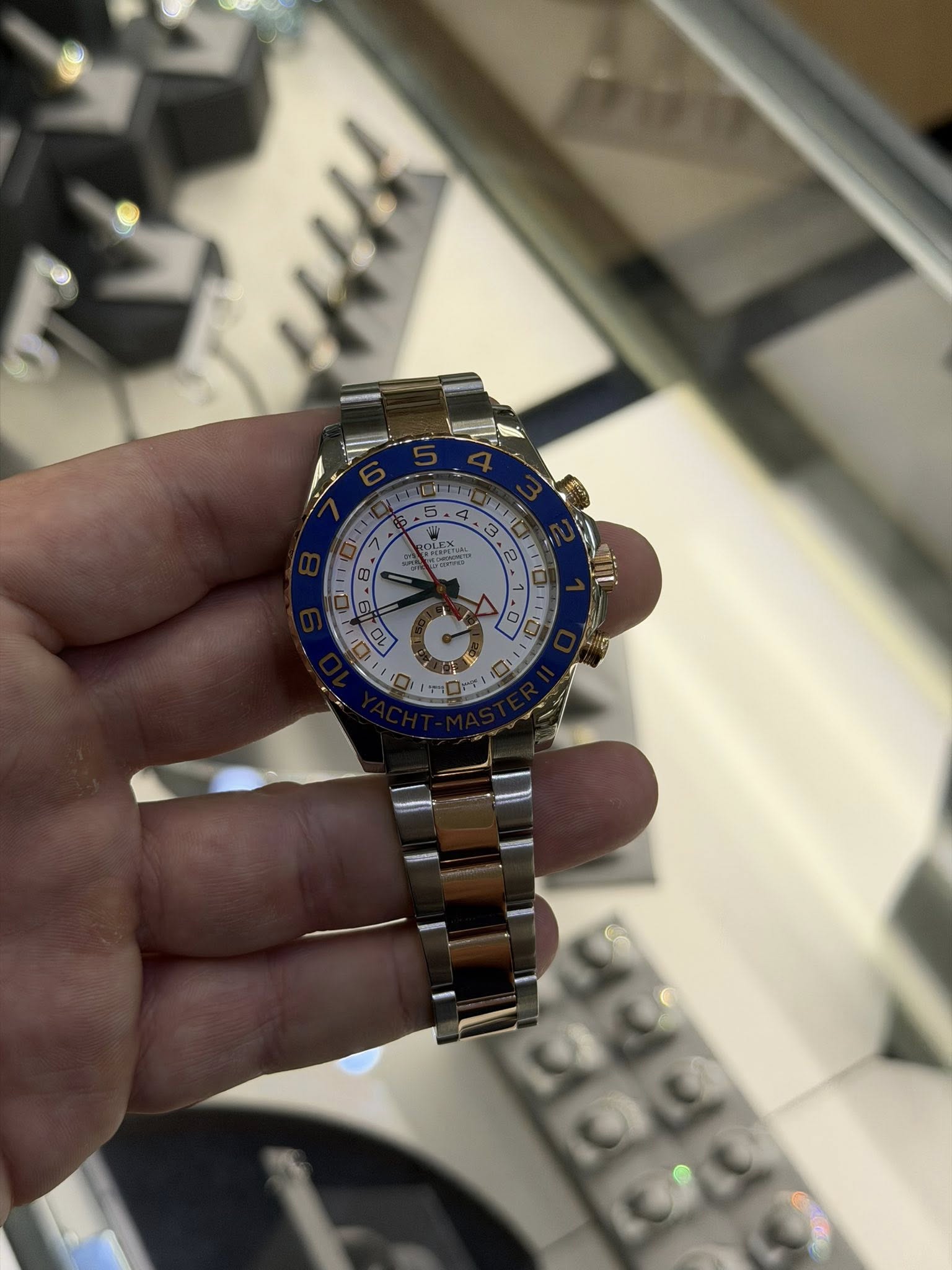 May be an image of wrist watch and text